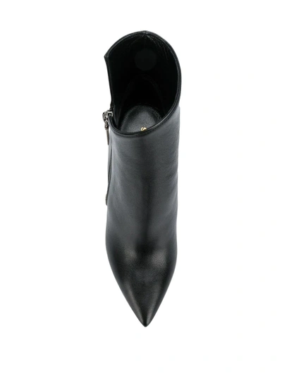 Shop Saint Laurent Niki 85 Asymmetric Boots In Black