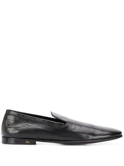 Shop Dolce & Gabbana Vintage Effect Loafers In Black