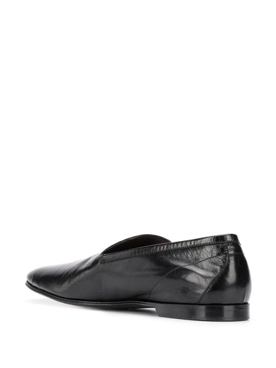 Shop Dolce & Gabbana Vintage Effect Loafers In Black
