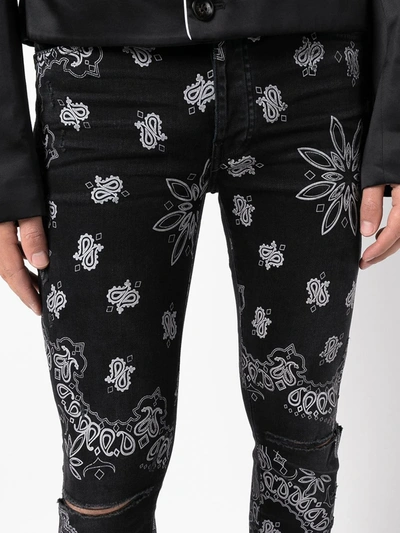 Shop Amiri Paisley-print Slim-fit Jeans In Black