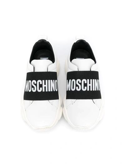 Shop Moschino Logo Strap Sneakers In White