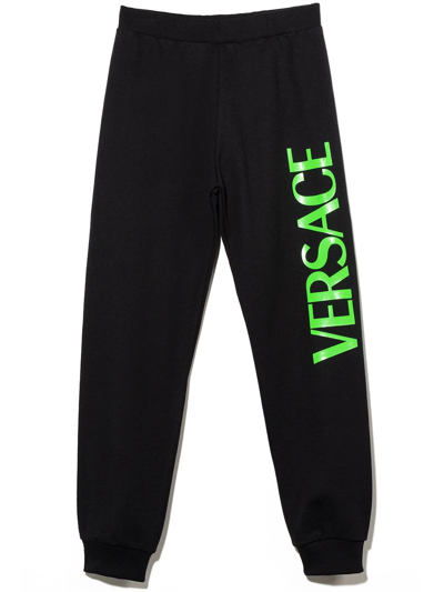 Shop Versace Logo-print Tapered Track Pants In Black