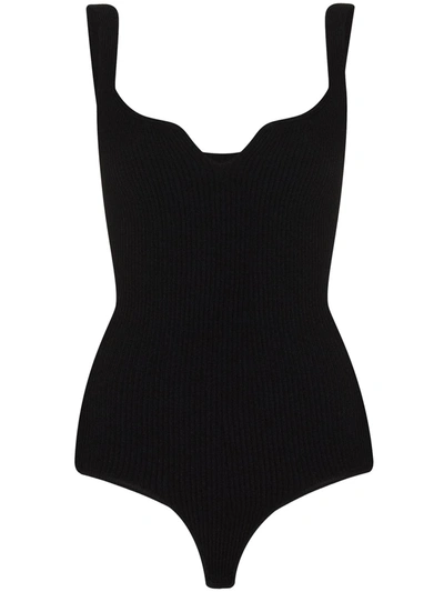 Shop Khaite The Yves Ribbed-knit Bodysuit In Black