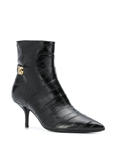 Shop Dolce & Gabbana Cardinale Crossed Logo Ankle Boots In Black