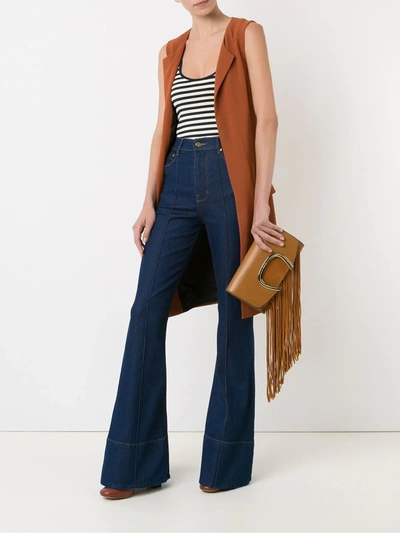 Shop Amapô High Waist Flared Jeans In Blue