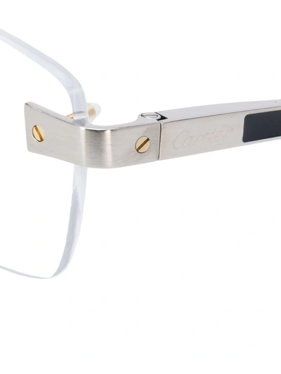 Shop Cartier Rectangular Frame Rimless Glasses In Silver