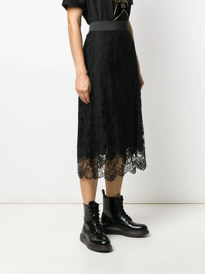 Shop Dolce & Gabbana Floral Lace Midi Skirt In Black