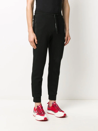 Shop Armani Exchange Tapered Track Pants In Black