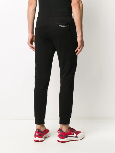 Shop Armani Exchange Tapered Track Pants In Black