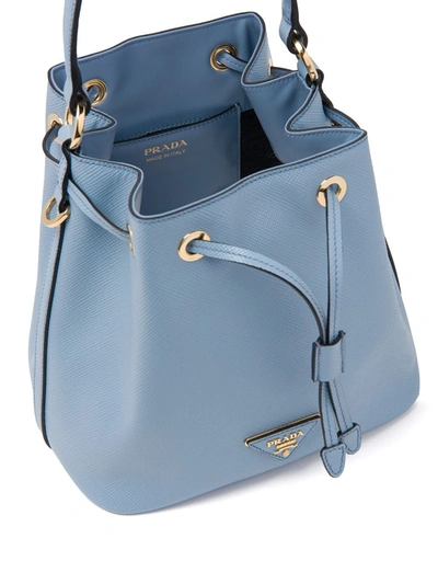Shop Prada Saffiano Bucket Bag In Blue
