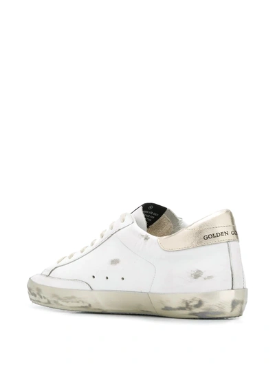 Shop Golden Goose Super-star Low-top Sneakers In White