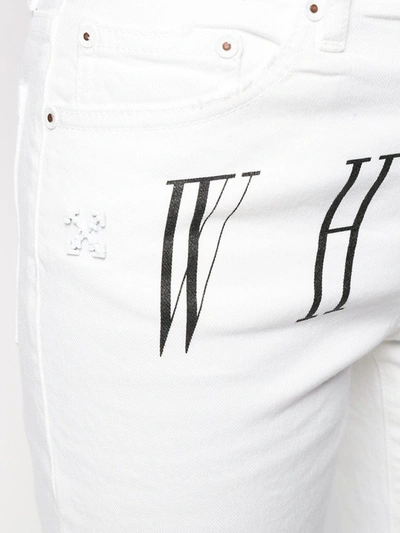 Shop Off-white Logo Print Cropped Jeans In White
