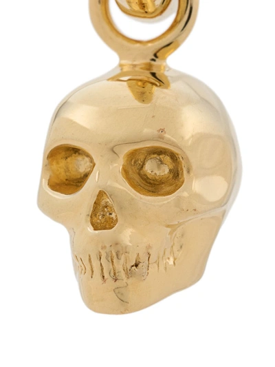 Shop Northskull Skull Charm Hoop Earring In Gold