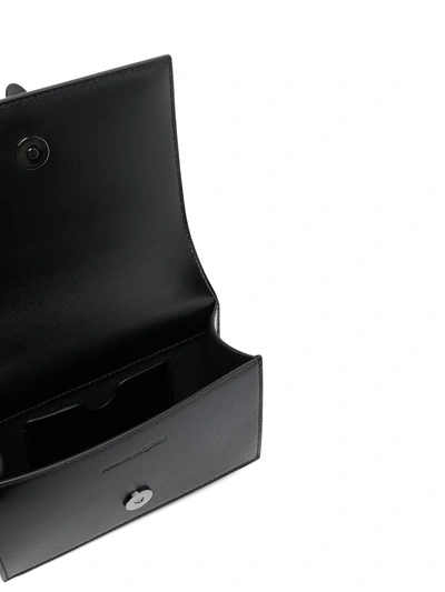 Alexander Mcqueen Blackout Leather Crossbody Knuckle Bag In Black