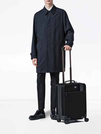 Shop Prada Logo Four-wheel Suitcase In Black