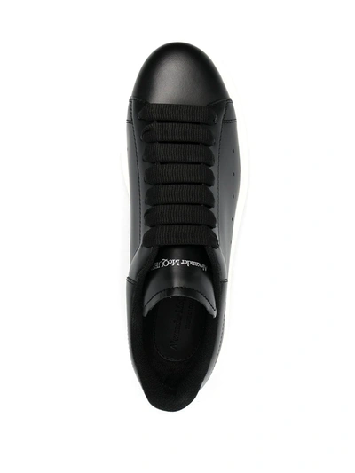 Shop Alexander Mcqueen Oversized Leather Sneakers In Black