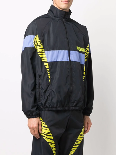 Shop Moschino Panelled Zebra Windbreaker In Black