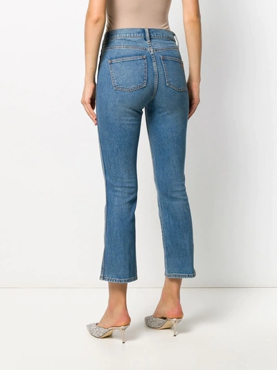 Shop Tory Burch Cropped Flared Jeans In Blue