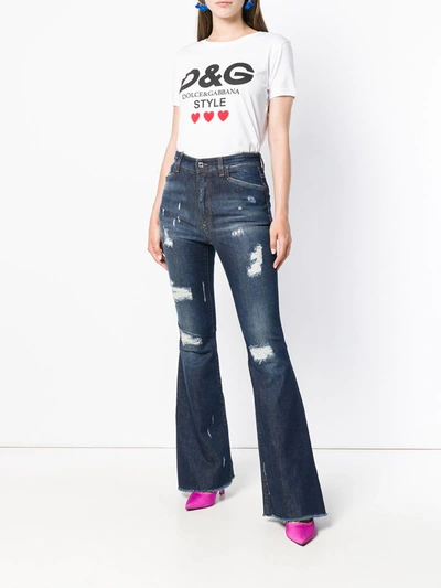 Shop Dolce & Gabbana Ripped Detail Bootcut Jeans In Blue