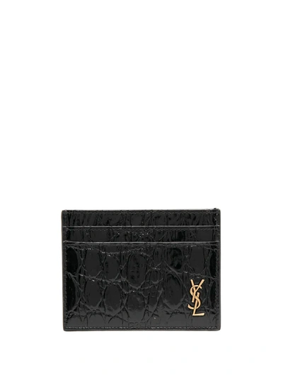 Shop Saint Laurent Tiny Monogram Crocodile-embossed Cardholder In Black