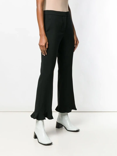 Shop Stella Mccartney Ruffle Flare Tailored Trousers In Black