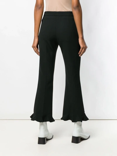 Shop Stella Mccartney Ruffle Flare Tailored Trousers In Black