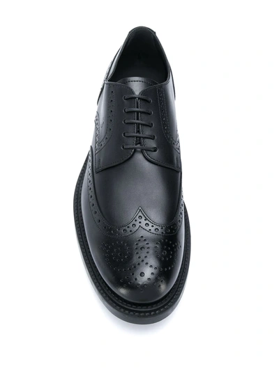 Shop Tod's Wingtip Monogram Brogues In Black