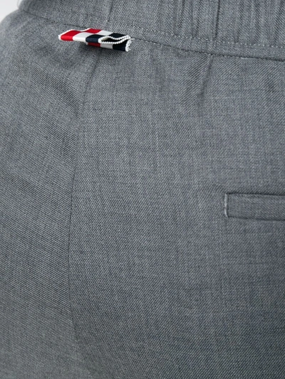 Thom Browne Snap Front Elastic Waist Track Trouser In 035 Med Grey