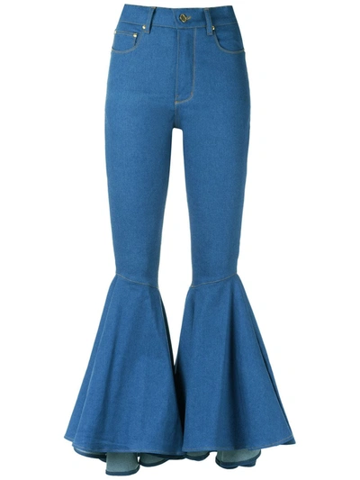 Shop Amapô Flared Jeans In Blue