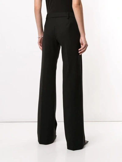 Shop Dion Lee Low-waist Pleated Trousers In Black