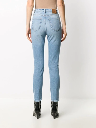 Shop Totême Slim-fit High-rise Jeans In Blue