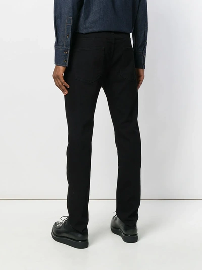 Shop Valentino Slim-fit Rockstud Jeans In Black
