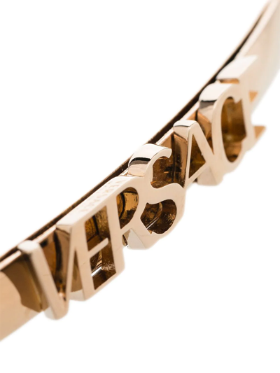 Shop Versace Logo-lettering Hairclip In Gold