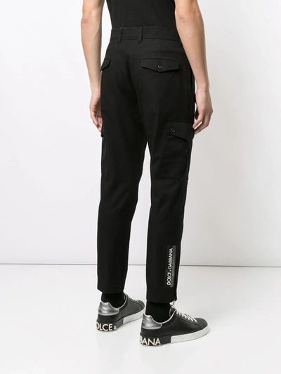 Shop Dolce & Gabbana Multi-pocket Tapered Trousers In Black