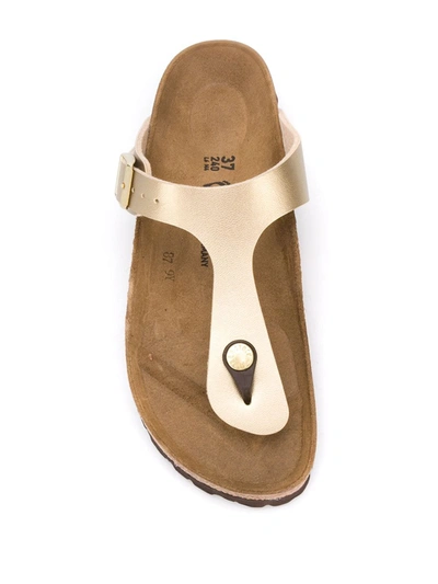 Shop Birkenstock Gizeh Slip-on Sandals In Gold