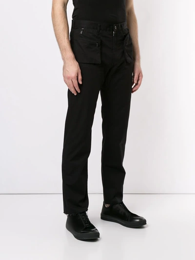 Shop Undercover Zipped Pockets Trousers In Black