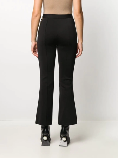 Shop Givenchy Chain Flared Trousers In Black