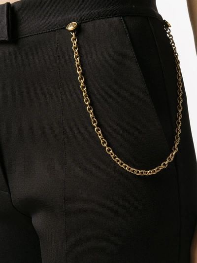 Shop Givenchy Chain Flared Trousers In Black