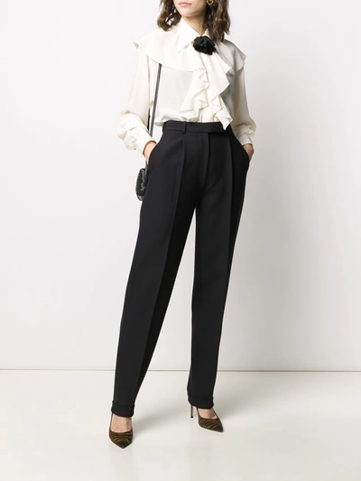 Shop Victoria Beckham Pleated Front Tapered Trousers In Black