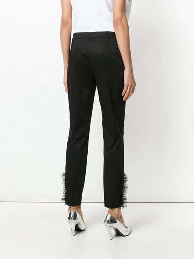 Shop Moschino Tulle Cuff Tailored Trousers In Black