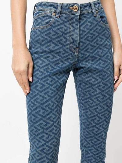 Shop Versace Greca-print Skinny Jeans In Blue