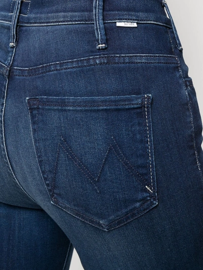 Shop Mother Boot Cut Faded Jeans In Blue