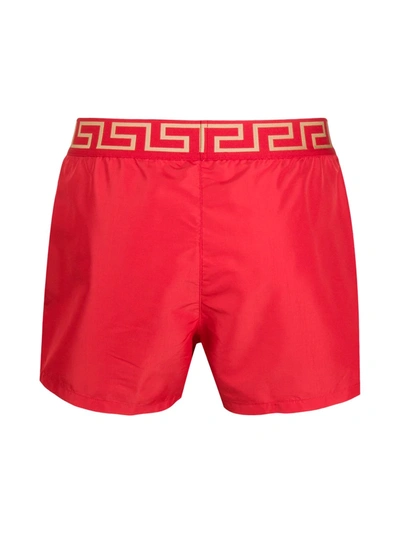 Shop Versace Greca Key Swimming Trunks In Red