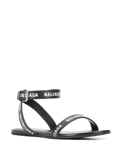 Shop Balenciaga Round Flat Sandals In Black