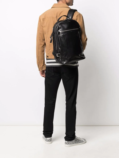 Shop Saint Laurent Logo-print Polished-finish Backpack In Black
