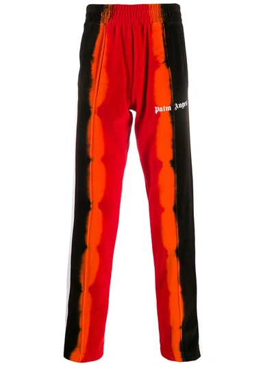 Shop Palm Angels Tie-dye Print Track Pants In Red