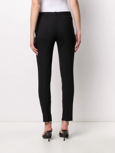 Shop Versace Skinny Tailored Trousers In Black