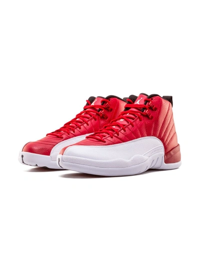 Shop Jordan Air  12 Retro Sneakers In Red ,white