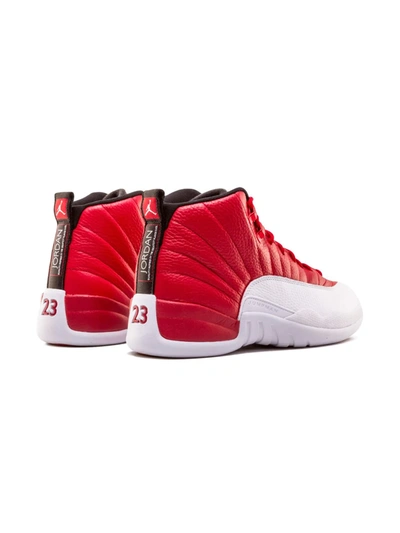 Shop Jordan Air  12 Retro Sneakers In Red ,white