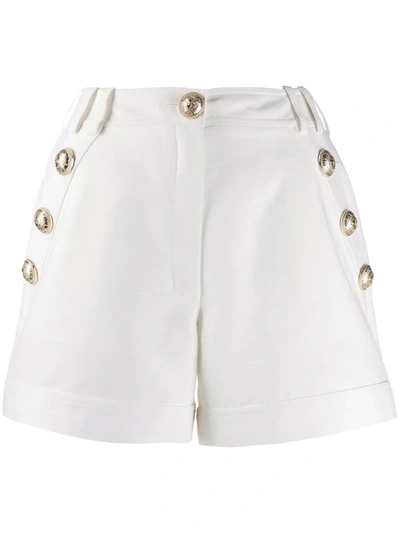 Shop Balmain Button-embellished Tailored Shorts In White